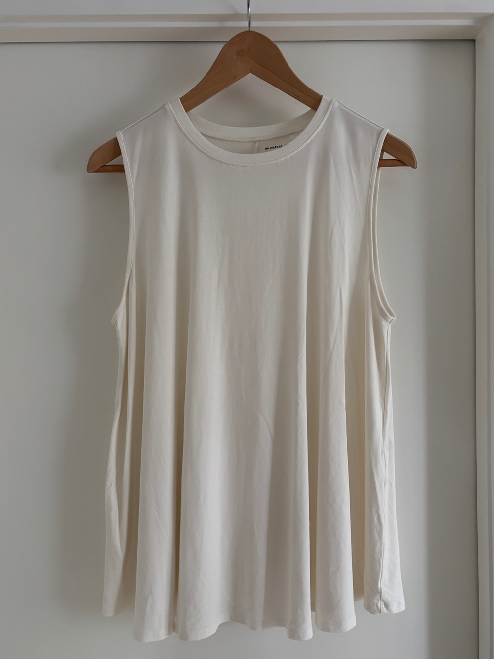Sleeveless Cream Swing Sleeeveless Top